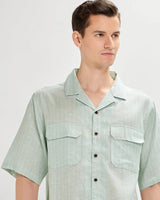 Green oversized striped linen shirtUnited By Hope