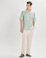 Green oversized striped linen shirtUnited By Hope