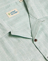 Green oversized striped linen shirtUnited By Hope