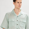 Green oversized striped linen shirtUnited By Hope