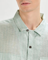 Green oversized striped linen shirtUnited By Hope