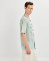 Green oversized striped linen shirtUnited By Hope