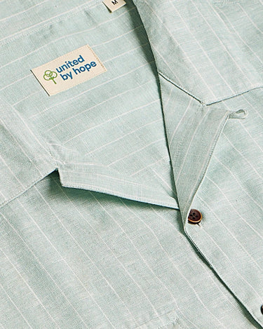 Green oversized striped linen shirtUnited By Hope