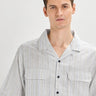 Grey oversized striped linen shirtUnited By Hope